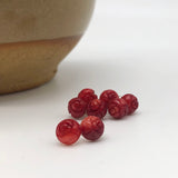 Carved Bamboo Coral Rose Earrings